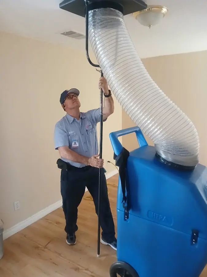 Mini Split Installation technician using HEPA equipment in Mason City